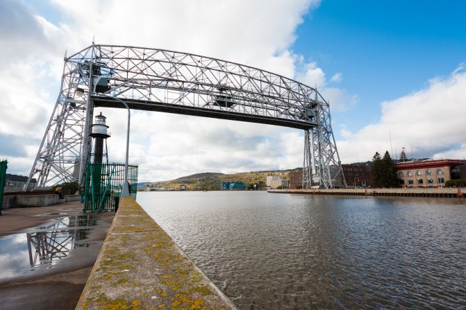 One of the finest road trips in the Upper Midwest is the 1,200-mile Lake Superior loop around the shores of Lake Superior. One of Duluth's unique attractions is the Aerial Lift Bridge, which raises and lowers like an elevator to let ships pass underneath in and out of the city's harbor.