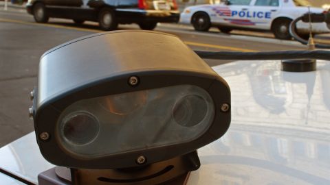 A 'license plate reader'  is mounted on a police car in Washington, D.C. It automatically records license plates of cars going by.