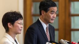Hong Kong's embattled leader, Chief Executive Leung Chun-ying (R) and Chief Secretary Carrie Lam hold a press conference at Leung's official residence in Hong Kong on October 2, 2014, just minutes before a midnight deadline set by protesters demanding his resignation expired.