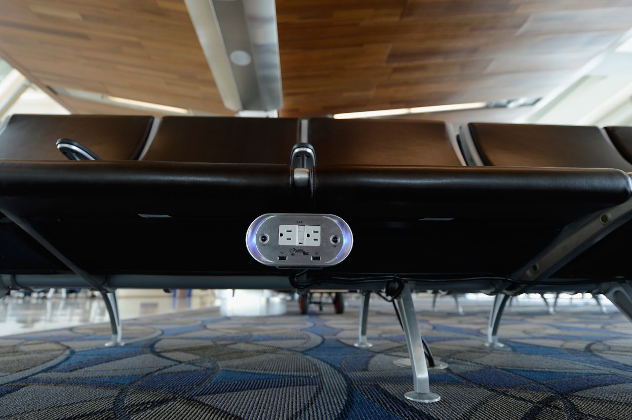 Some airports, such as the new terminal at LAX, have power outlets beneath every bench for passengers. But some travelers still don't want to share.  