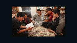 In happier times, the Deghayes brothers sit and study the Koran. They are British born and bred, their father arrived in Britain from Libya. Abdullah (front left), Amer (center) and Jaffar (front right) left their home in Brighton and headed to fight for the Al Nusra Front in Syria. Abdullah died fighting the Syrian regime forces in April.