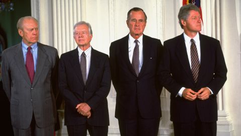 From left, Former Presidents Gerald Ford, Jimmy Carter and George H.W. Bush join Clinton at the White House for the signing of the North American Free Trade Agreement in September 1993.