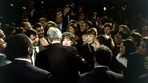 White House intern Monica Lewinsky embraces Clinton at a Democratic fundraiser in Washington, DC, in October 1996.