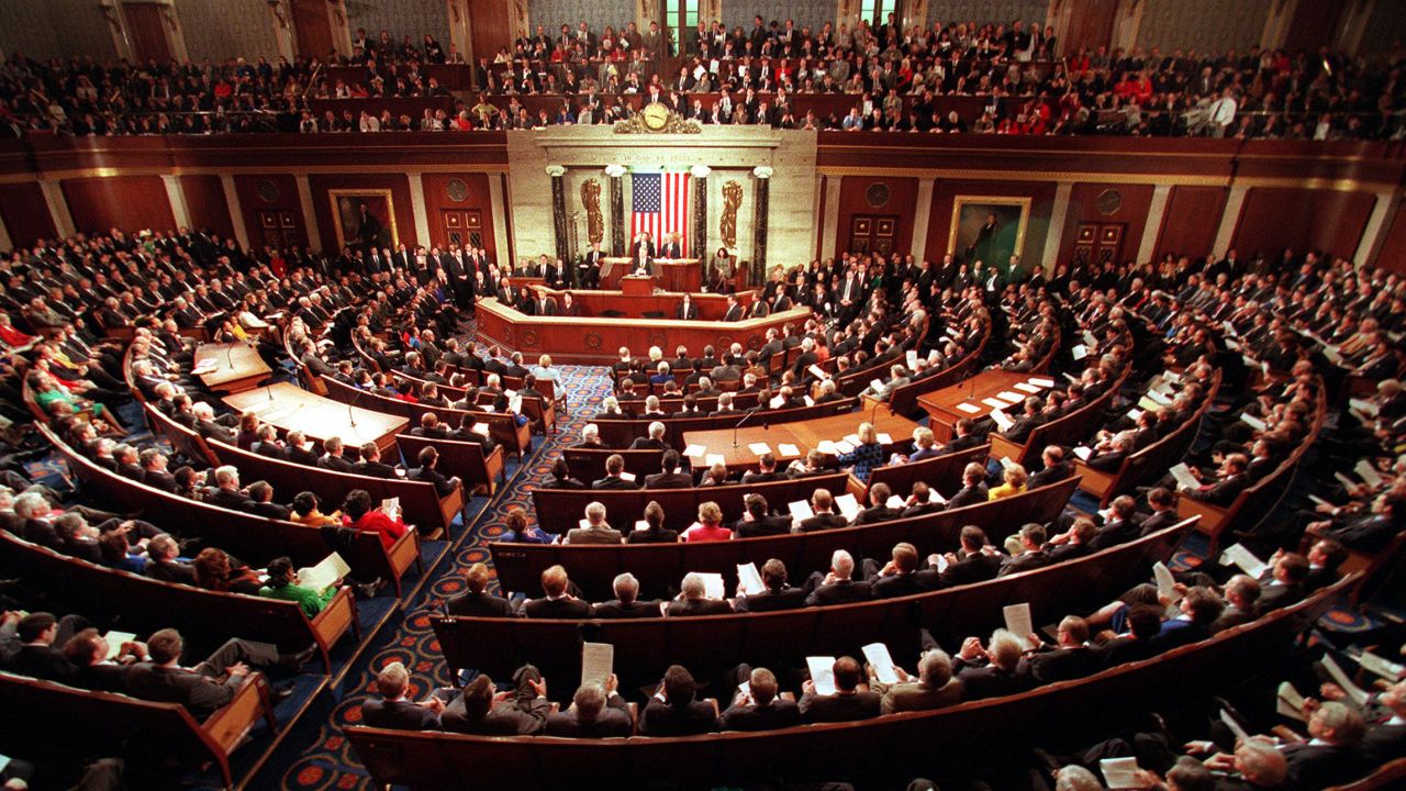 Members of the 105th Congress fill the Senate chamber as Clinton delivers his State of the Union address in January 1998.