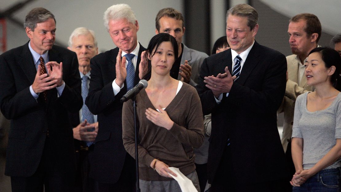 Journalist Laura Ling speaks in front of Euna Lee, former Vice President Al Gore and former President Bill Clinton after Ling and Euna Lee arrive in Burbank, California after being released by North Korean authorities on August 5, 2009. 