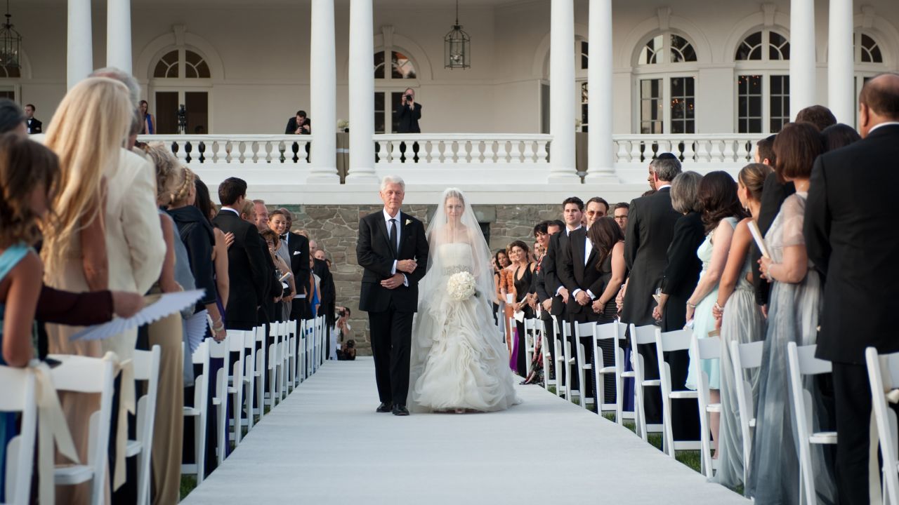 The former President walks his daughter down the aisle during her wedding to Marc Mezvinsky in July 2010.
