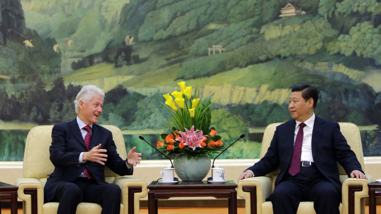 Clinton speaks to Chinese President Xi Jinping during a meeting in Beijing in November 2013.