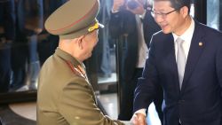Caption:INCHEON, SOUTH KOREA - OCTOBER 04: South Korean unification minister Ryoo Kihl-Jae (R) shakes hands with Hwang Pyong-So (L) vice chairman of North Korea's National Defense Commission on October 4, 2014 in Incheon, South Korea. The North Korean delegation, including Hwang Pyong-So, who is thought to be the country's No.2 after Kim Jong-Un, made a surprise visit to South Korea to attend the closing ceremony of the Asian Games. (Photo by Chung Sung-Jun/Getty Images)