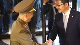 INCHEON, SOUTH KOREA - OCTOBER 04: South Korean unification minister Ryoo Kihl-Jae (R) shakes hands with Hwang Pyong-So (L) vice chairman of North Korea's National Defense Commission on October 4, 2014 in Incheon, South Korea. The North Korean delegation, including Hwang Pyong-So, who is thought to be the country's No.2 after Kim Jong-Un, made a surprise visit to South Korea to attend the closing ceremony of the Asian Games. (Photo by Chung Sung-Jun/Getty Images)