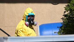 A hazmat team arrives to clean a unit at the Ivy Apartments, where a confirmed Ebola virus patient was staying, on October 3 in Dallas.