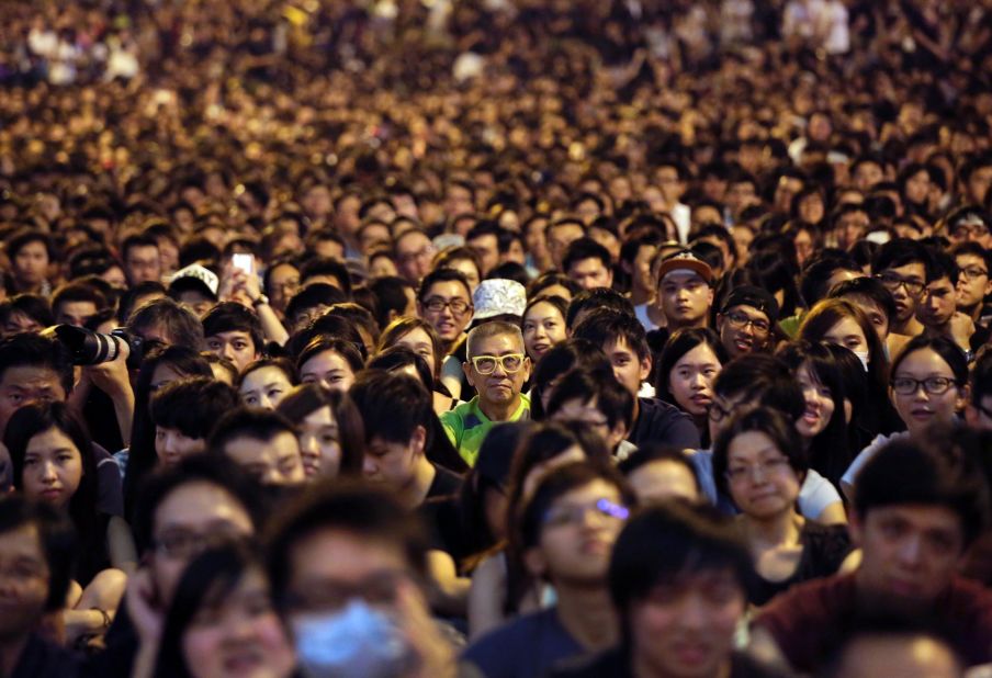 Thousands of pro-democracy activists attend a rally on the streets near government headquarters on October 4 in Hong Kong.