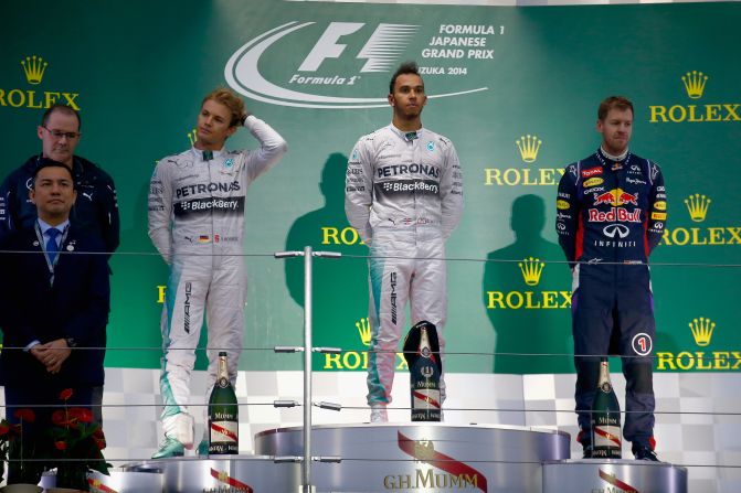 The mood on the victory podium was subdued and the champagne celebrations were abandoned by Mercedes duo Lewis Hamilton and Nico Rosberg and Red Bull Racing's Sebastian Vettel.