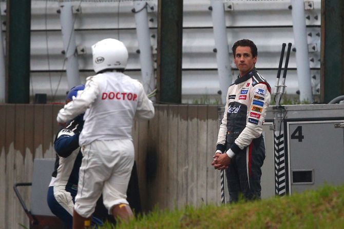 A visibly distressed Adrian Sutil witnessed the crash. Bianchi collided with a recovery vehicle that was attempting to move the German's Sauber.