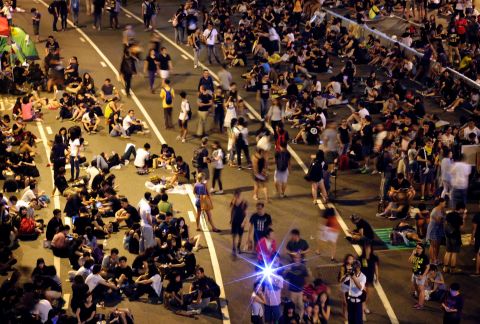 Pro-democracy demonstrators occupy the streets near government headquarters on October 5. 