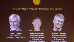 A giant screen displays the winners of the 2014 Nobel Medicine Prize on October 6, 2014 at the Karolinska Institutet in Stockholm, Sweden.