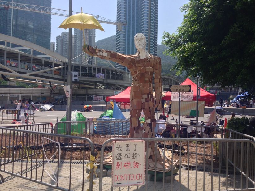 The statue "Umbrella Man," by the Hong Kong artist known as Milk, stands at a pro-democracy protest site in the Admiralty district on October 6.