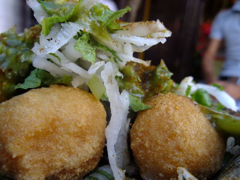 These deep-fried moong balls with chili-coriander sauce make a great power lunch. Ram laddoo stalls are everywhere in New Delhi.