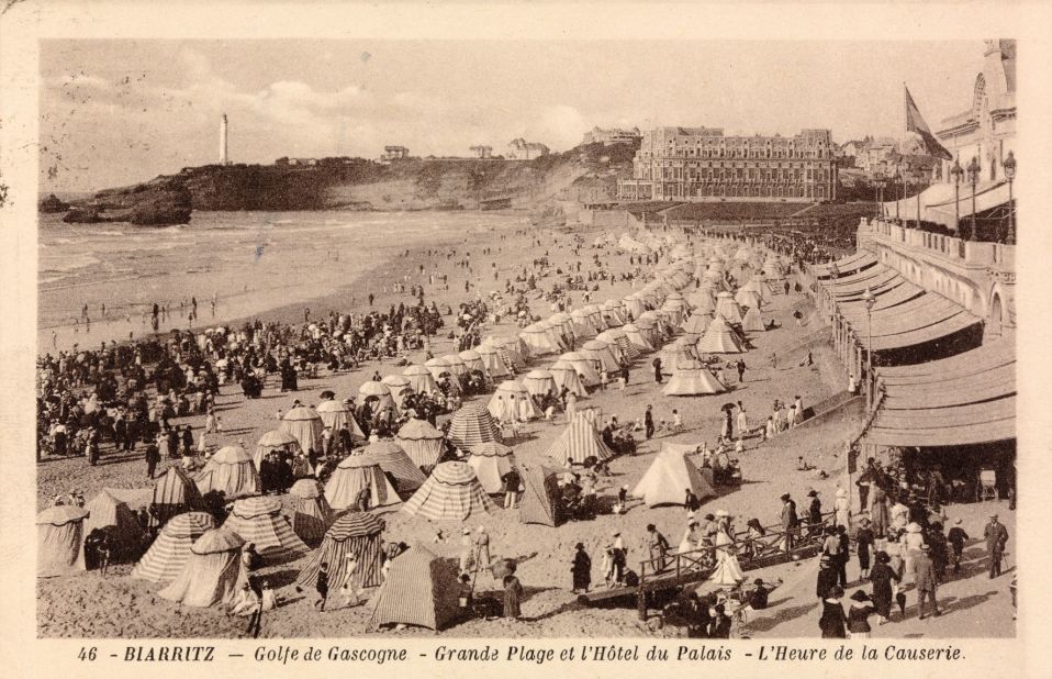 Rows of tents are seen on the beach in this card from France's swanky coastal resort of Biarritz dated 1929.