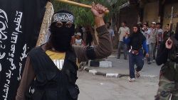 Caption:Islamic fighters from the al-Qaida group in the Levant, Al-Nusra Front, wave their movement's flag as they parade at the Yarmuk Palestinian refugee camp, south of Damascus, to denounce Israels military offensive on the Gaza Strip, on July 28, 2014. Israeli shells struck a UN school in Gaza early today, killing 16, as ground troops made a signficant push into the territory despite Palestinian efforts to broker a 24-hour truce. AFP PHOTO/RAMI AL-SAYED (Photo credit should read RAMI AL-SAYED/AFP/Getty Images)