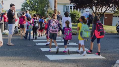 Children form a walking school bus at Van Derveer Elementary School in New Jersey in the United States.