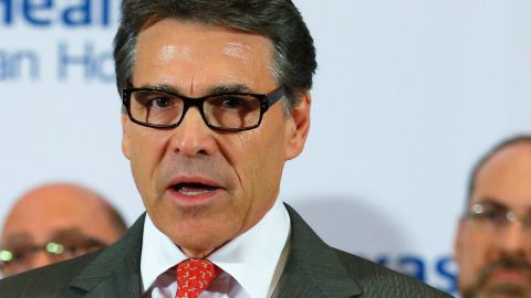 Texas Gov. Rick Perry says he's tracking the response to Ebola during his European trip.