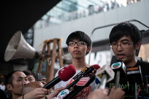 Student leaders Joshua Wong, left, and Alex Chow helped launch the current protests. They are demanding "real democracy" for Hong Kong.