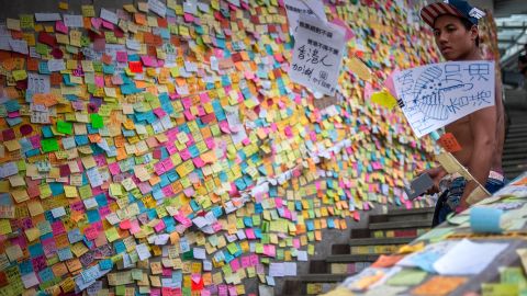 A wall of post-it notes is likened to a "paper Twitter"  