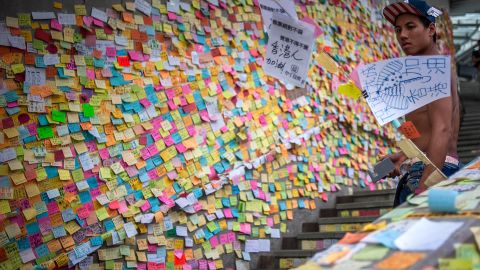 A wall of post-it notes is likened to a "paper Twitter"