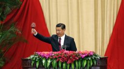Chinese President Xi Jinping toasts the present and past leaders, together with other guests at the National Day reception in the Great Hall of the People in Beijing on September 30, 2014. China's ruling Communist party will hold a key meeting in October, state media reported, as the leadership struggles with an economic slowdown and ongoing anti-corruption efforts. CHINA OUT AFP PHOTO (Photo credit should read STR/AFP/Getty Images)