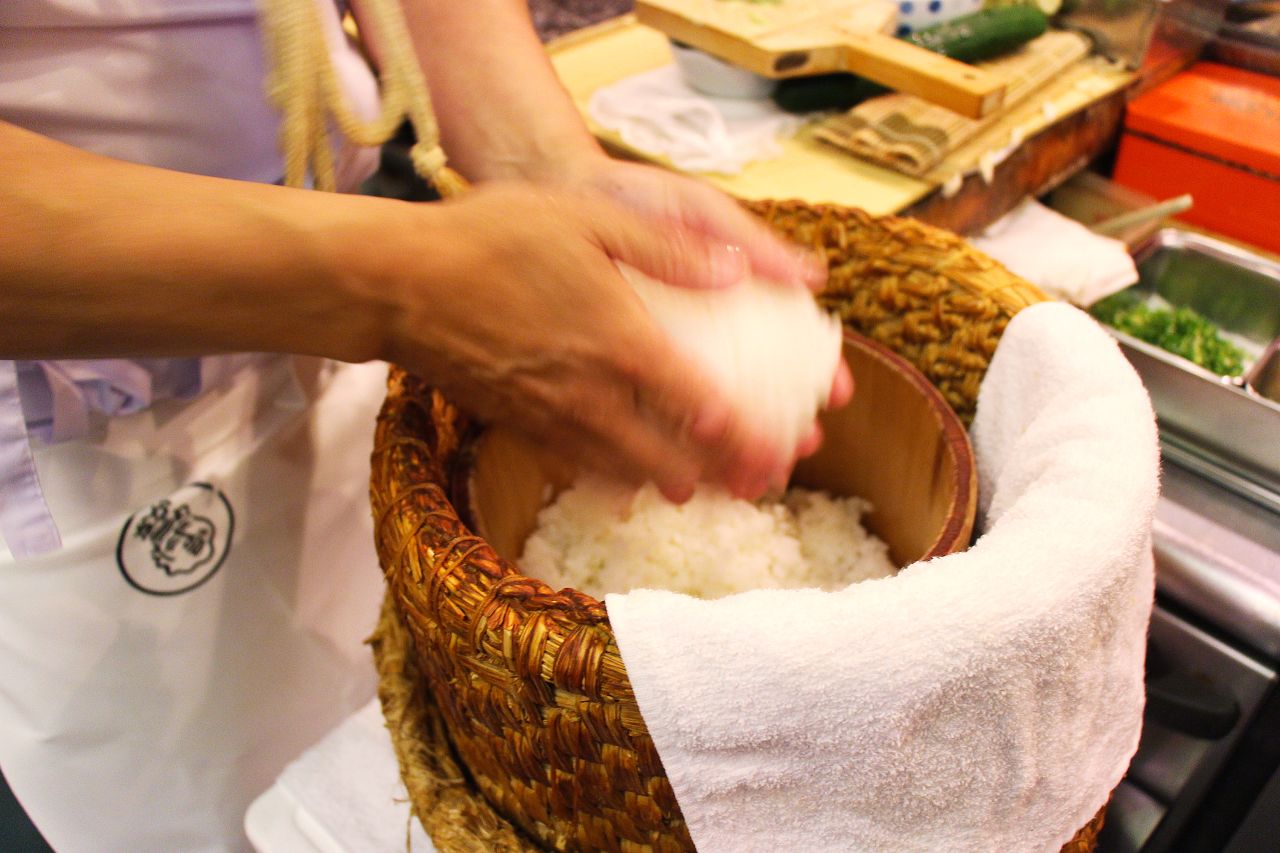 Once the rice is cooked, it should be quickly cooled using a fan while the seasoning -- vinegar, salt, sugar, Japanese rice wine -- is slowly mixed into the rice.