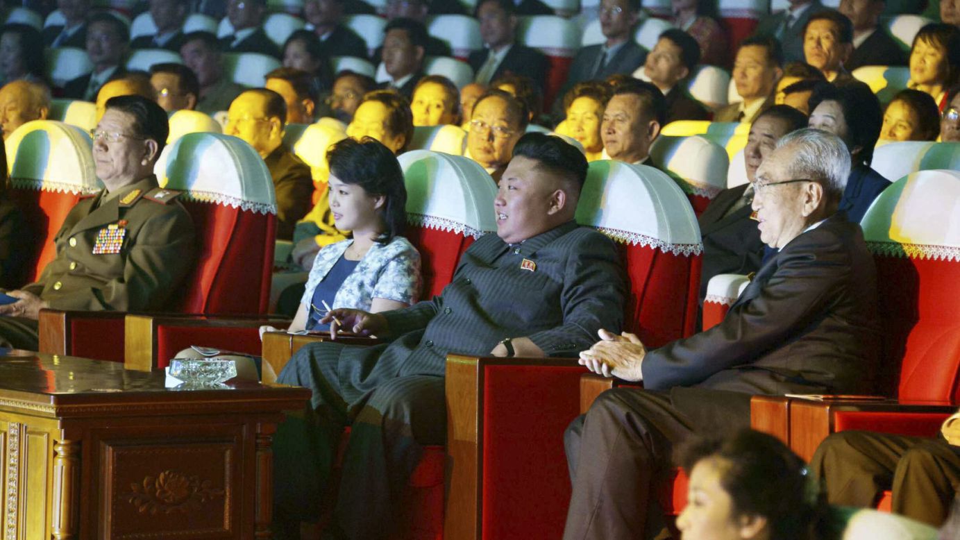 A picture released by the KCNA shows Kim and his wife watching a performance by the Moranbong Band on Wednesday, September 3, in Pyongyang.