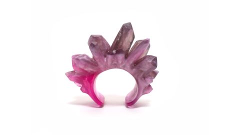 Using resin allows Rohde to work multiple color transitions into one piece, such as this crystal cuff which graduates from cloudy white to transparent pink.