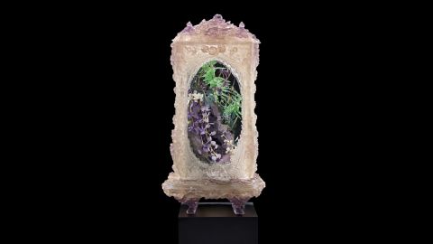 Crystals and Spiders represents one of Rohde's signature installations, with plants and minerals crammed into a baroque display case.