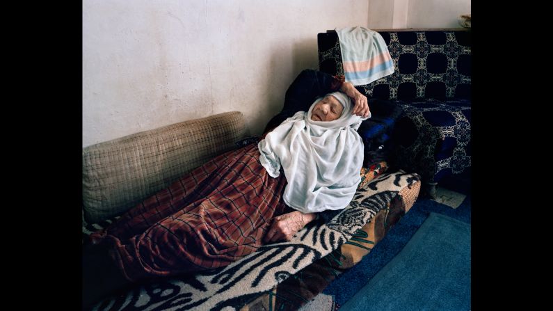 "Saada, 100, lies on a little mattress in the home she shares with her son in Bekaa Valley, Lebanon. She misses her freedom and her home in Syria." - UNHCR