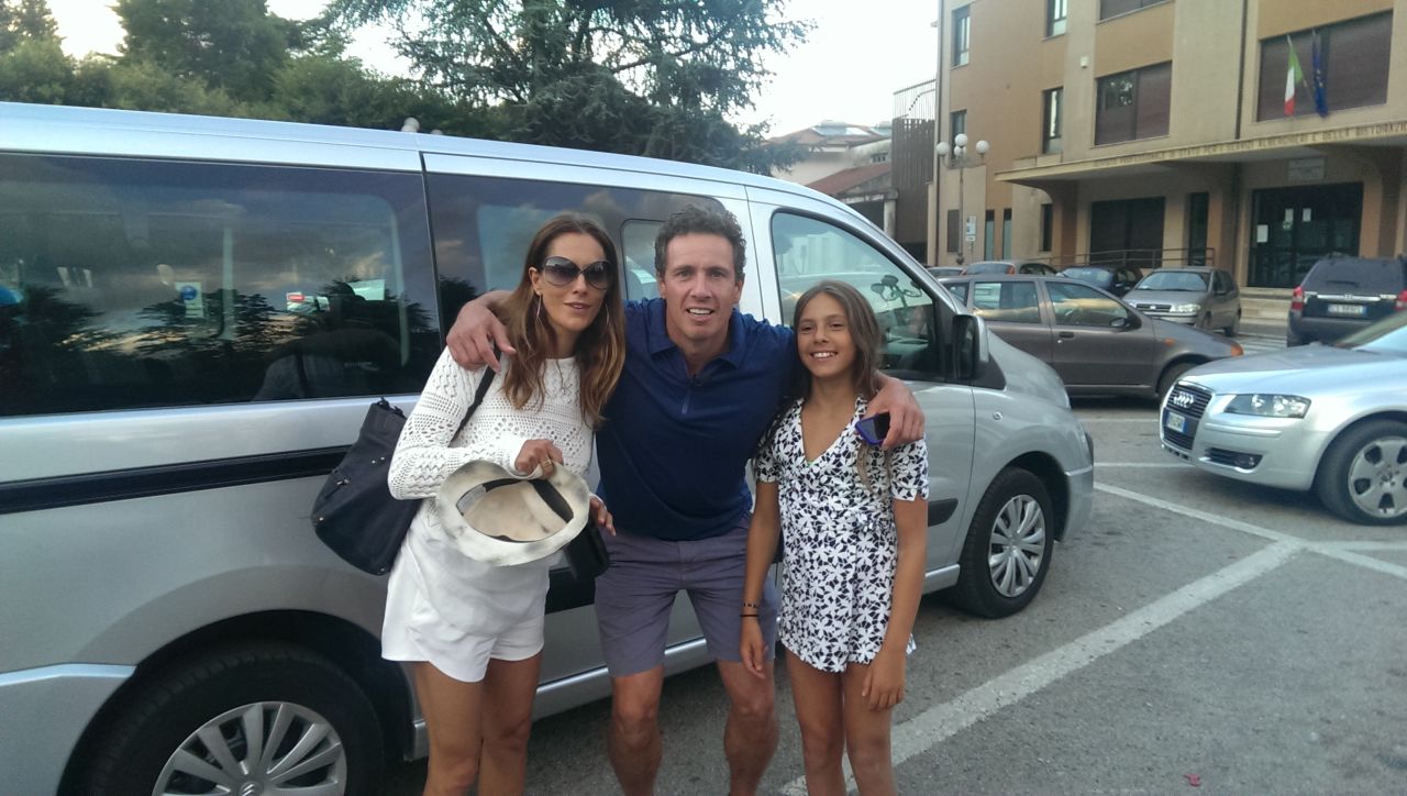 Cuomo poses with his wife, Cristina, and his eldest daughter, Bella, ahead of the Festival of San Rocco in Sant'Arsenio.