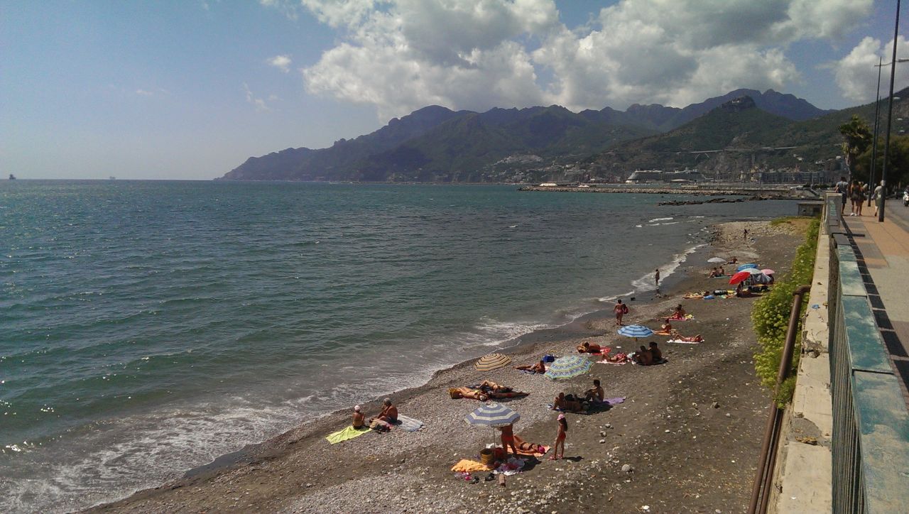 The beach in Salerno, Italy. The Tyrrhenian Sea is on the left. High in the hills are the towns where the Cuomos lived before making their way to America.