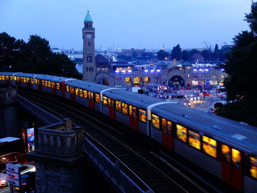 A train glides by the metro line in <a href="http://ireport.cnn.com/docs/DOC-1174120">Hamburg, Germany,</a> at dusk. 