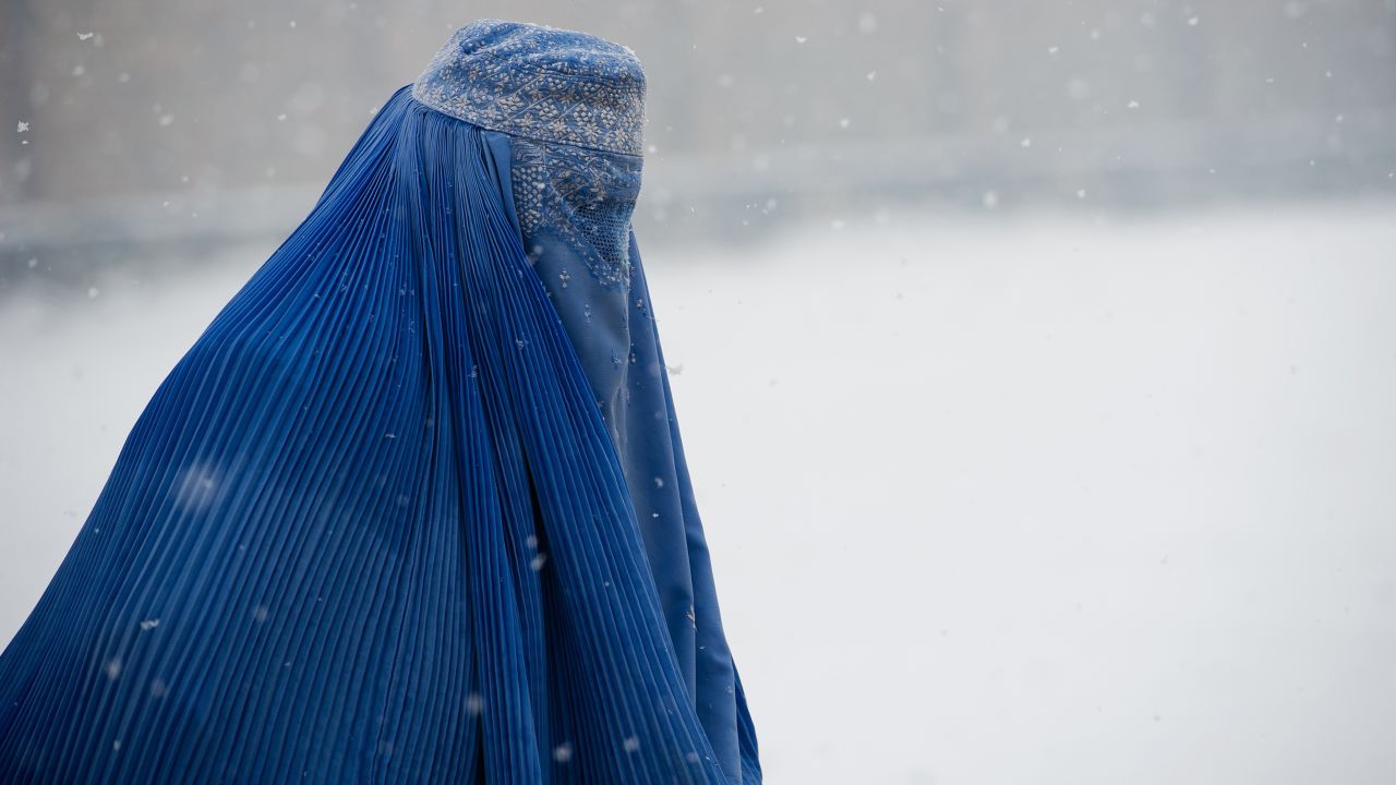 The burqa covers a woman from head to toe in a loose veil. It covers the face completely and has a mesh section over the eyes that allows the wearer to see. It is widely worn in Afghanistan. 