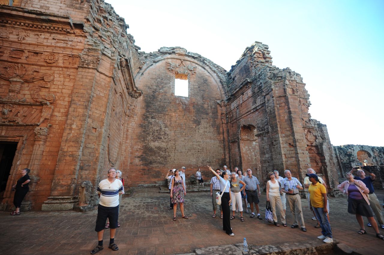 Tourists visit the Trinidad mission in 2013. The missions fell into ruin after Spain expelled the Jesuits from the New World in 1767.