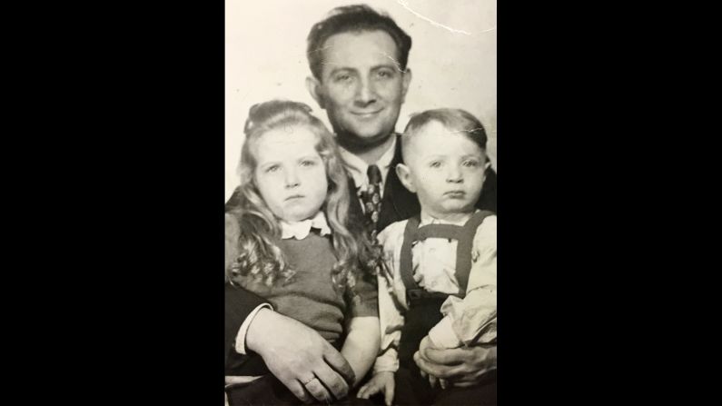 Blitzer's father, David, holds him and his sister in the early 1950s.