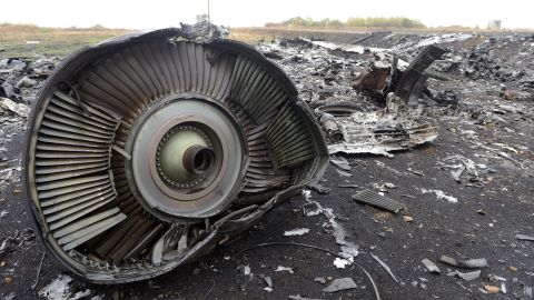 Debris from Malaysia Airlines Flight 17 sits in a field at the plane crash site in Hrabove, Ukraine.