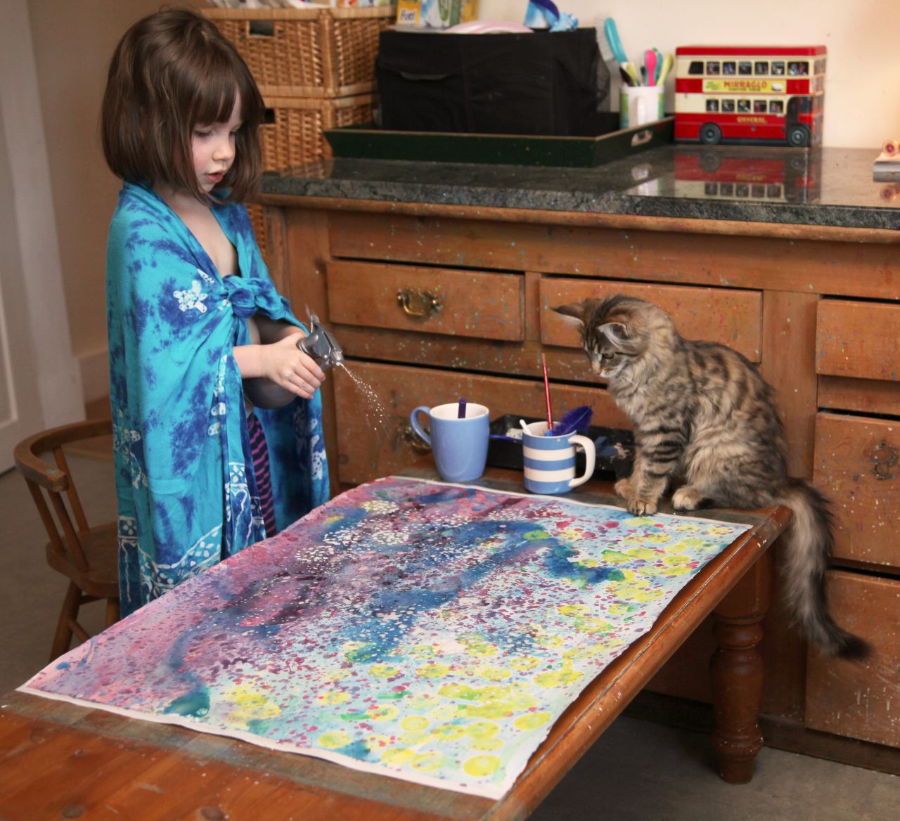 Iris' cat, Thula, is a 'therapy cat', who helps Iris develop a sense of companionship. The two are inseparable, especially when Iris is painting. They even have baths together.