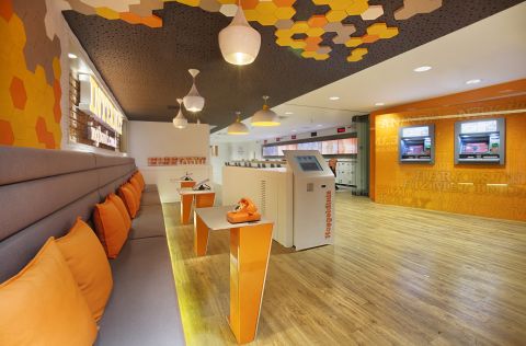 ING bank also partnered with design consultancy Allen International to create the first branch in Turkey without traditional tellers. The branch also features the latest "Q-matic" queuing system which allows customers to join lines remotely before they arrive at the bank. 