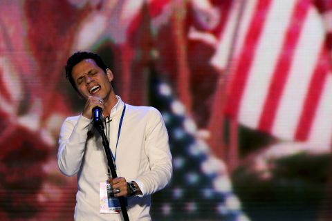 Musician Marc Anthony held a fundraiser for Obama in Miami in the summer of 2012. In this photo, he's performing for a sound check during the final day of the Democratic National Convention that year in Charlotte, North Carolina. 