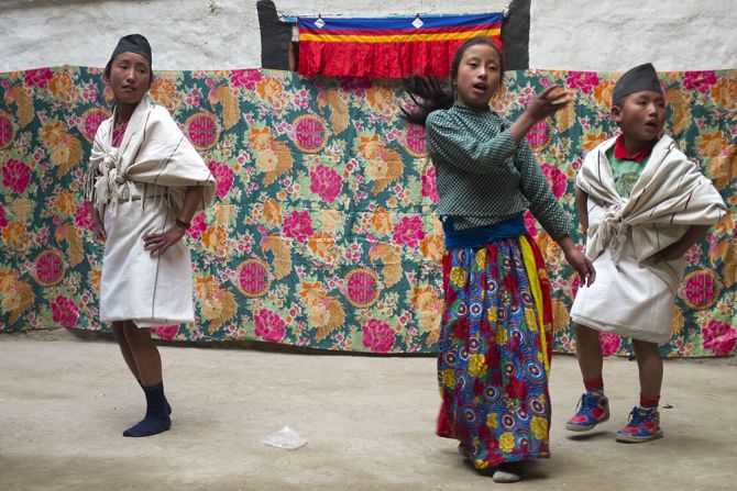 Children rehearse for one of the festivals and religious ceremonies celebrated throughout the year in Mustang.