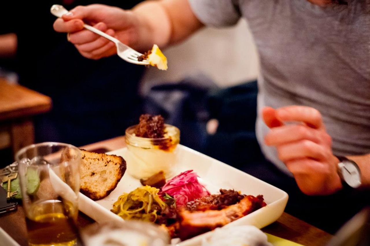 Blackened, fall-off-the-bone St. Louis ribs and tender pulled pork are signature dishes at the Pitt Cue Co.