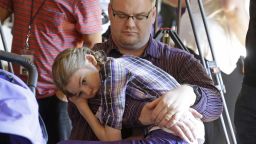 Marshall Christensen holds his daughter Jessica, who has a severe form of epilepsy known as Dravet Syndrome.