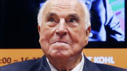 Former German Chancellor Helmut Kohl looks up during the presentation of the new edition of his book "Helmut Kohl, from the fall of the Berlin Wall until the reunification" at the Book Fair in Frankfurt, Germany, October 8, 2014. (AP Photo/Michael Probst)
