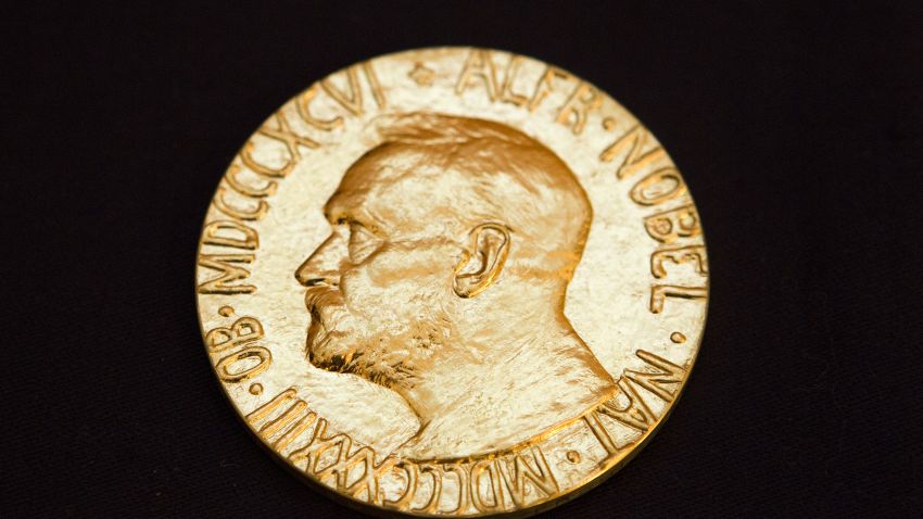 Caption:This picture taken on December 10, 2010 shows the front of the Nobel medal awarded to the Nobel Peace Prize laureate for 2010, jailed Chinese dissident Liu Xiabo. The Nobel Peace Prize ceremony began in Oslo Friday without guest of honour Liu Xiaobo, a jailed Chinese dissident who was represented by an empty chair at the event. Other Chinese dissidents, ambassadors from a number of countries, Norway's king and queen and other dignitaries were present as the ceremony opened in a flower-decked Oslo city hall. AFP PHOTO / SCANPIX - Berit Roald (Photo credit should read BERIT ROALD/AFP/Getty Images)