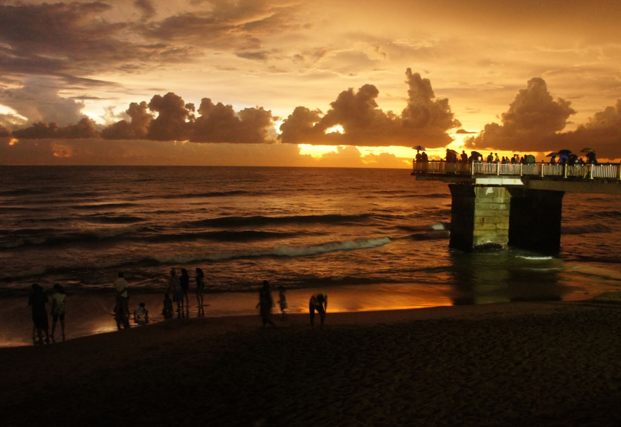 A warm sunset settles over the Galle Face Green promenade in the business district of <a href="http://ireport.cnn.com/docs/DOC-1099937">Colombo, Sri Lanka</a>. The ocean-side urban park is a popular destination for residents and tourists.